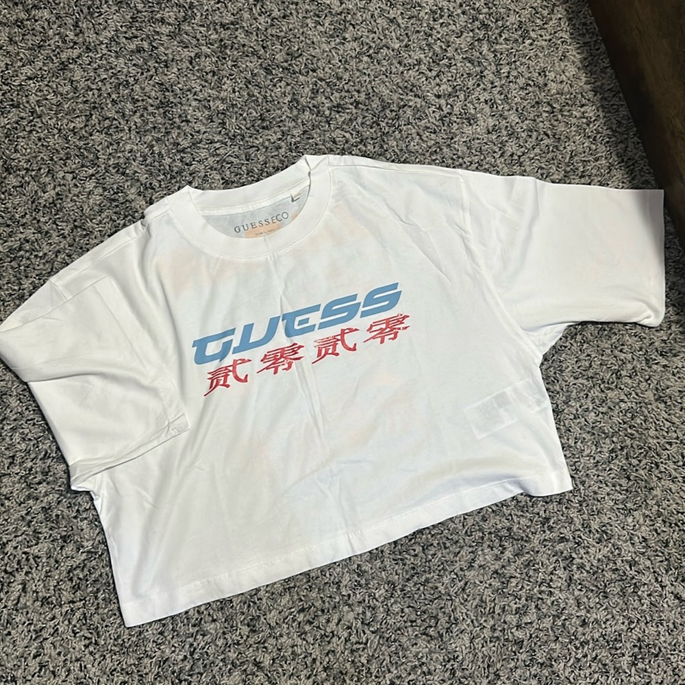 NWOT. Woman’s GuessEco cropped white T-shirt. Size S. With Japan Tokyo graphic.